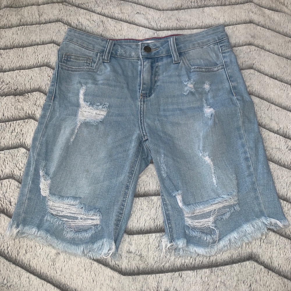 Cut off distressed denim shorts